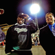 Bobbie Miles (c.) with ‘Friday Night Lights’ director Peter Berg (l.) and former teammate Brian Chavez.